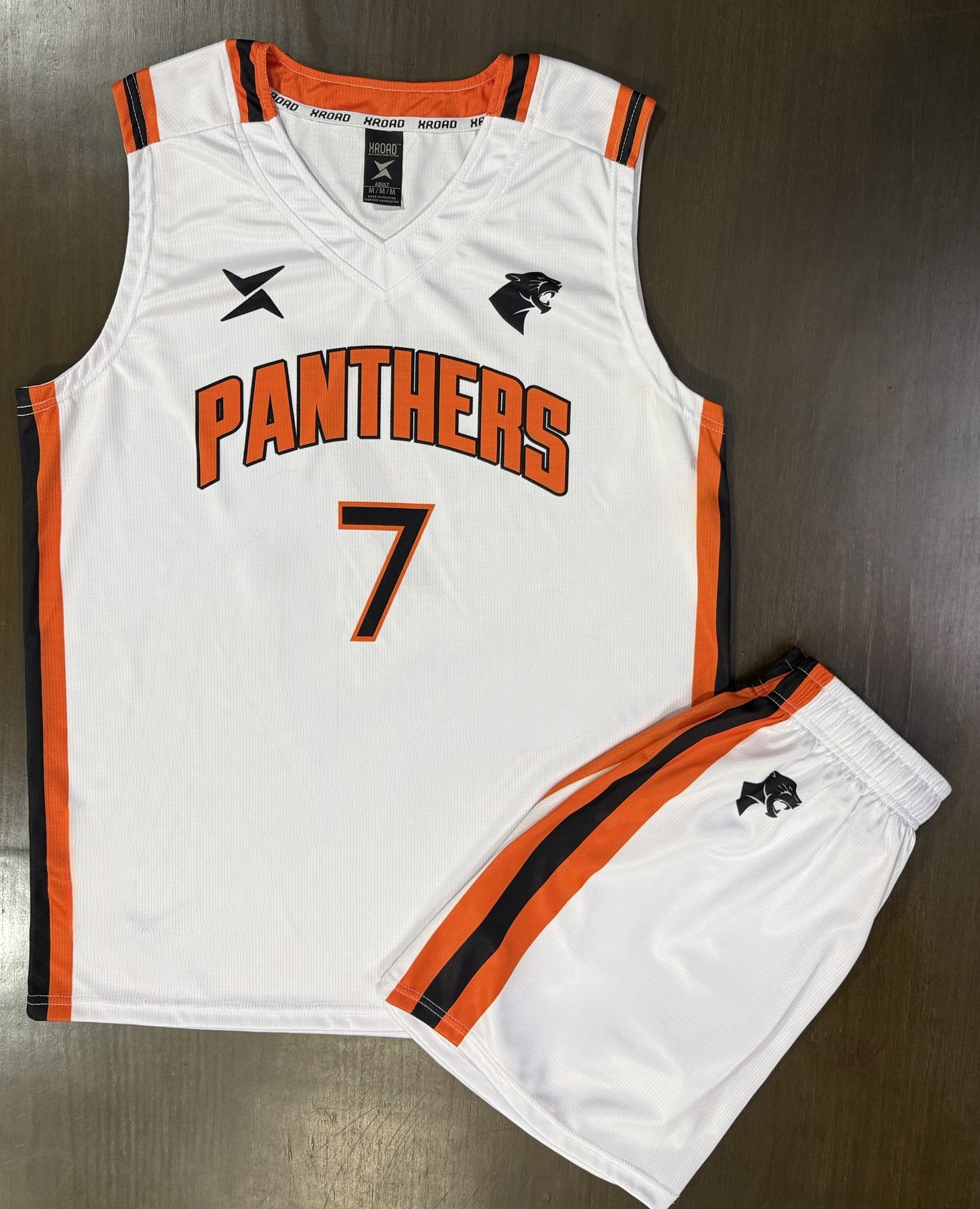 Original Panthers jersey photograph showing fine knit, stitching, XROAD mark and printed team lettering